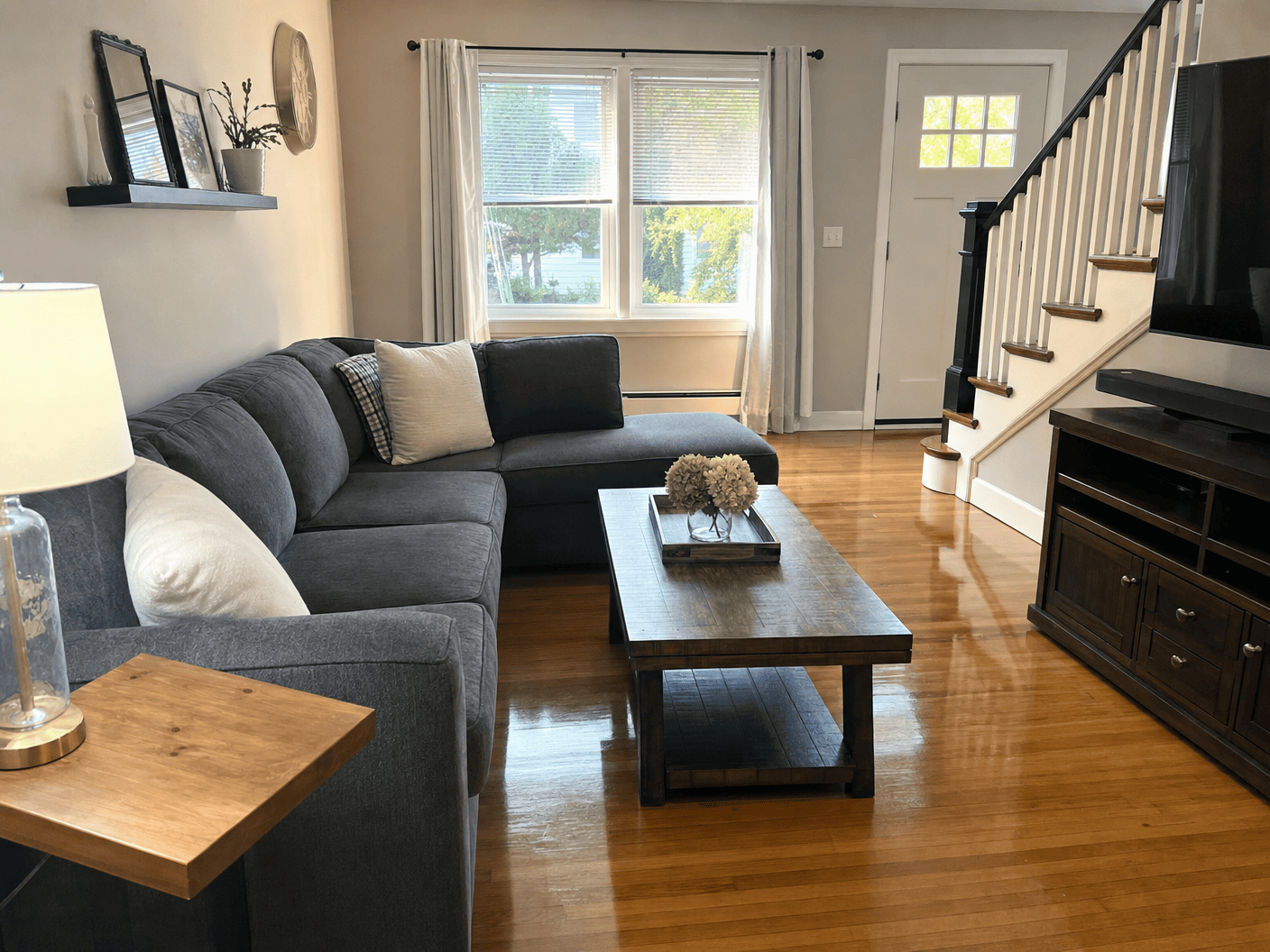 Freshly cleaned living room with polished wood floors